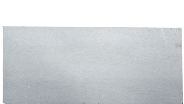 Basaltine Filled Grey Limestone Slab